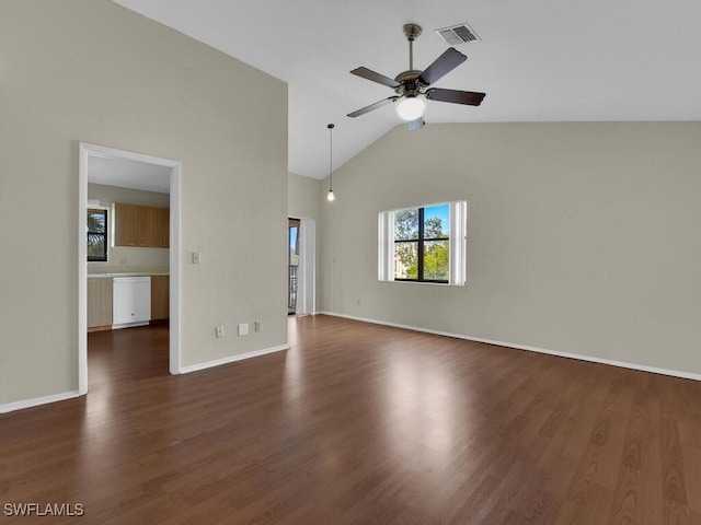 unfurnished living room featuring dark wood-type flooring, ceiling fan, and vaulted ceiling