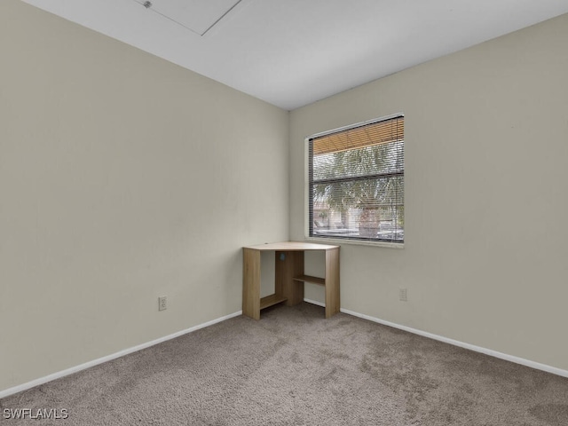 empty room featuring light colored carpet