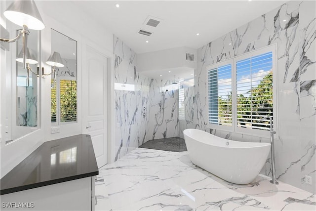 bathroom featuring independent shower and bath and tile walls