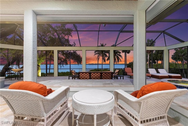 view of patio terrace at dusk