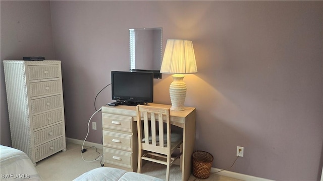 office area featuring light colored carpet