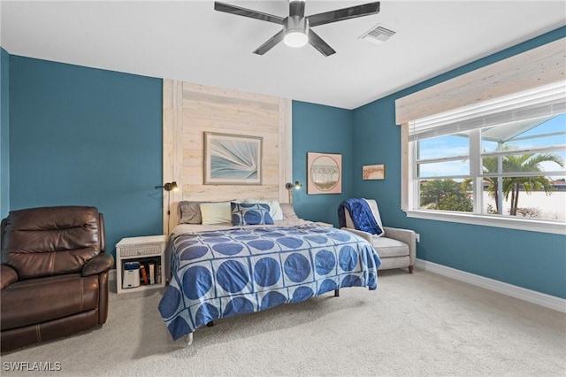 bedroom with ceiling fan and carpet flooring