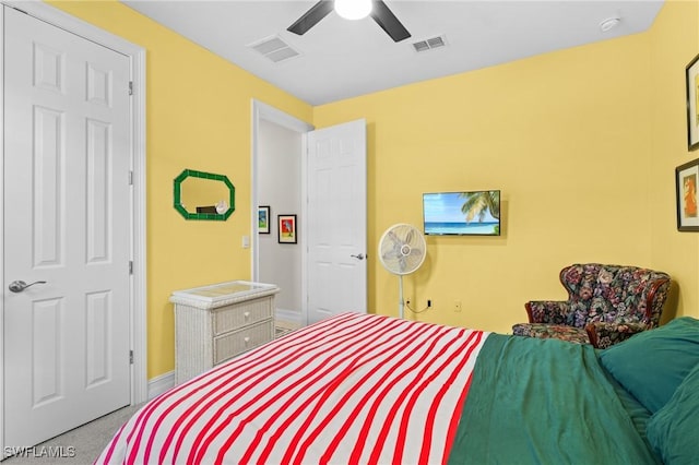 carpeted bedroom featuring ceiling fan