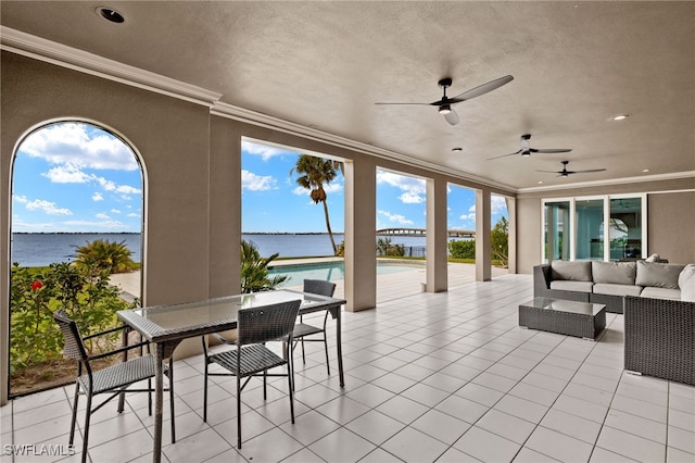 view of patio / terrace featuring an outdoor living space and a water view