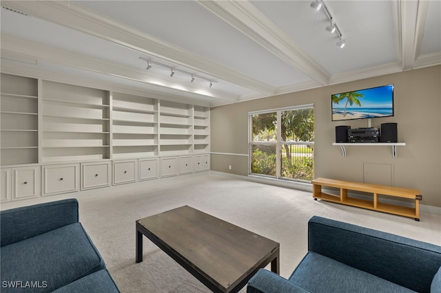 living room with ornamental molding, beam ceiling, and carpet floors