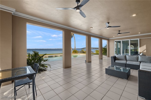 view of patio featuring a water view and outdoor lounge area