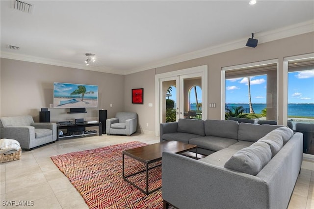 living room with french doors, ornamental molding, a water view, and light tile patterned flooring