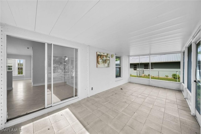 view of unfurnished sunroom