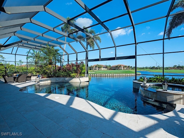 view of swimming pool with a patio area, glass enclosure, a water view, and an in ground hot tub