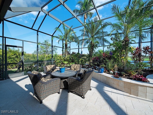 view of patio / terrace with glass enclosure