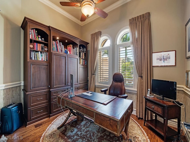 office area featuring ceiling fan, ornamental molding, and hardwood / wood-style floors