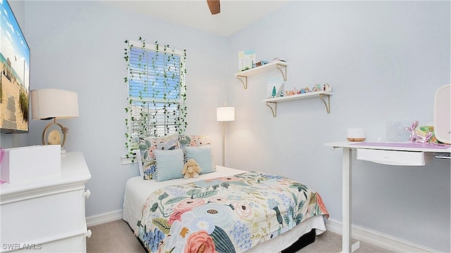 bedroom with ceiling fan and carpet