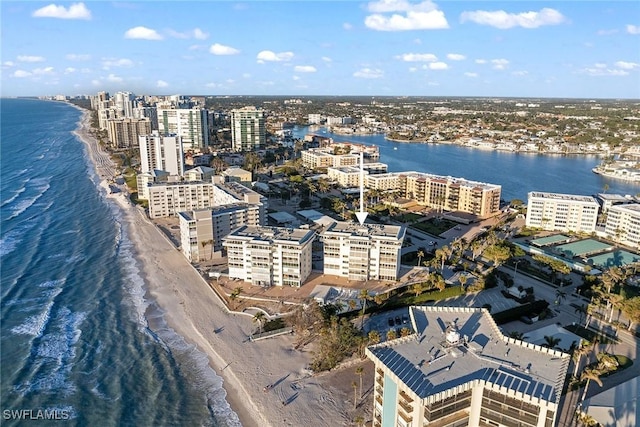 aerial view with a view of the beach and a water view