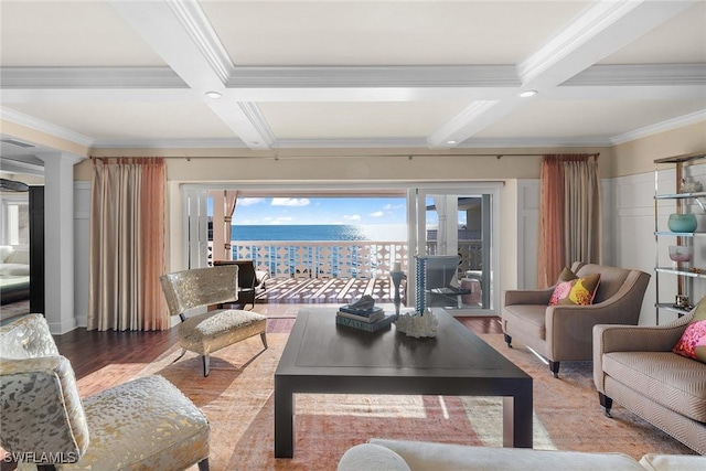 living room with ornamental molding, coffered ceiling, hardwood / wood-style flooring, and beam ceiling