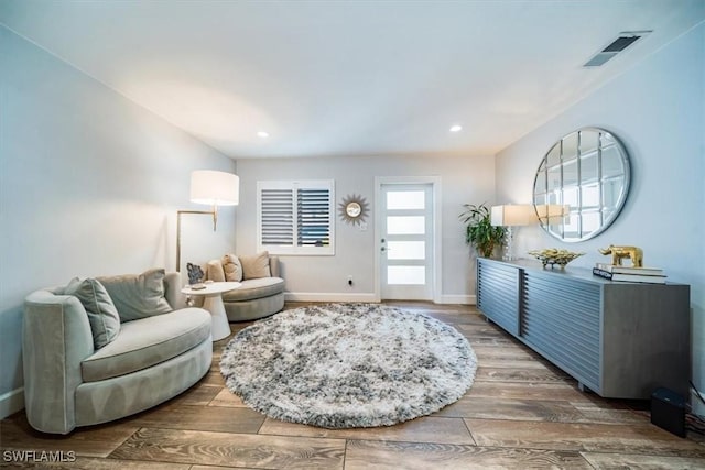 living room with dark wood-type flooring