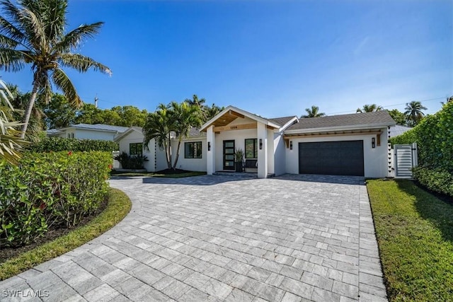 ranch-style home with a garage