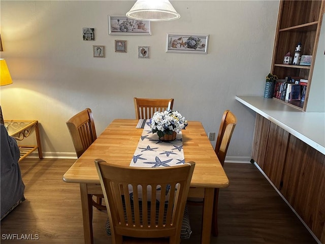 dining room featuring dark hardwood / wood-style floors