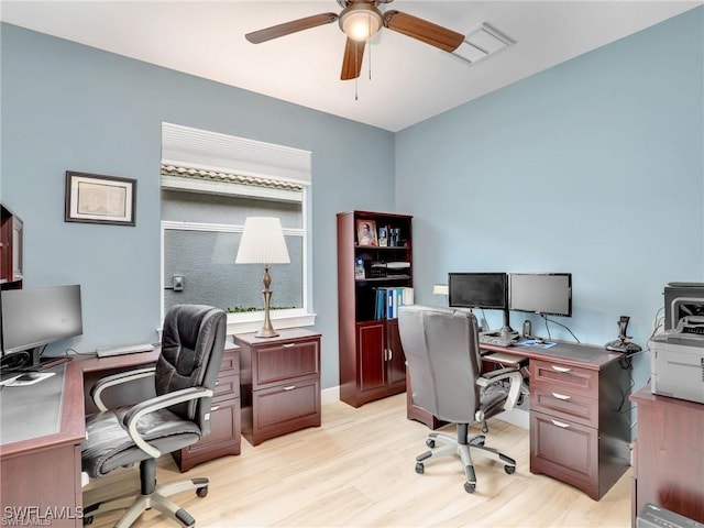 office space with ceiling fan and light hardwood / wood-style floors