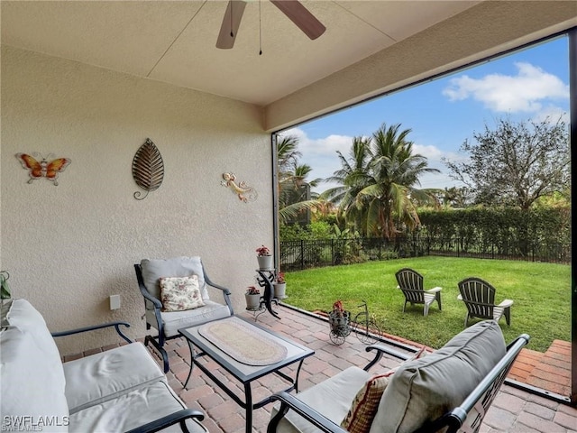 view of patio featuring ceiling fan and outdoor lounge area