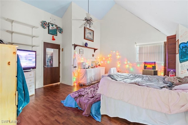 bedroom featuring high vaulted ceiling, ceiling fan, and dark hardwood / wood-style flooring