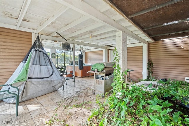 sunroom / solarium featuring vaulted ceiling