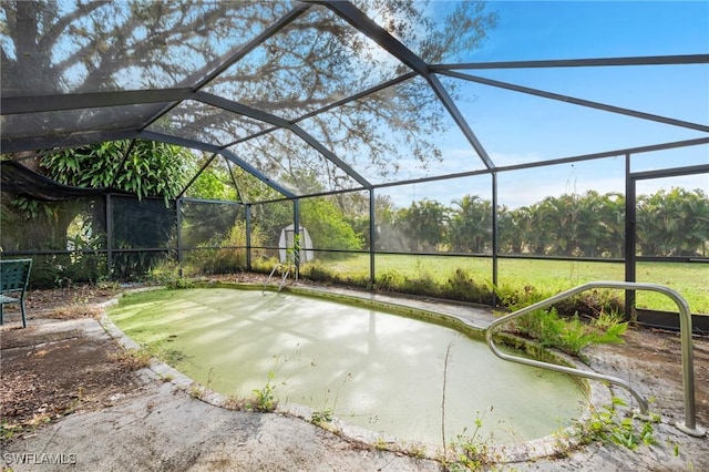 view of patio / terrace with a lanai