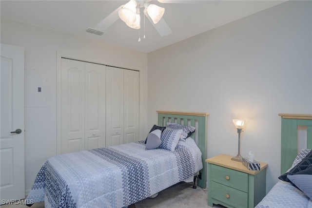 bedroom featuring carpet floors, a closet, and ceiling fan