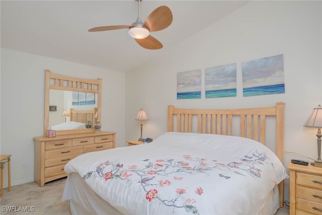 bedroom featuring vaulted ceiling and ceiling fan