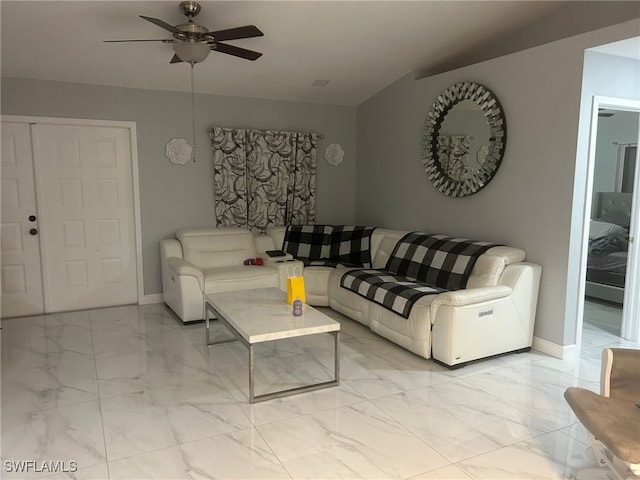 living room featuring ceiling fan