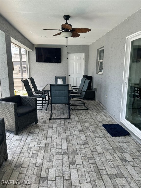 view of patio / terrace featuring ceiling fan