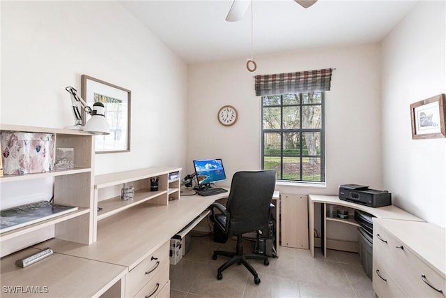 tiled home office with ceiling fan