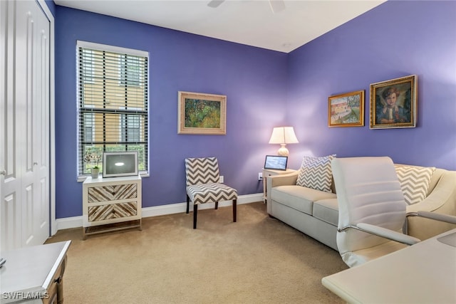1296 Verde Dr Unit 3, Naples, FL 34105 - carpeted living room featuring baseboards and a ceiling fan