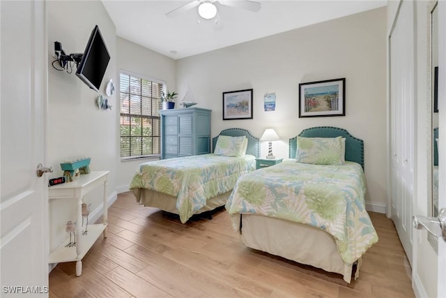 1296 Verde Dr Unit 3, Naples, FL 34105 - bedroom featuring wood finished floors and baseboards