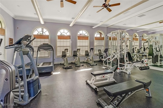 workout area with ornamental molding, visible vents, baseboards, and a ceiling fan