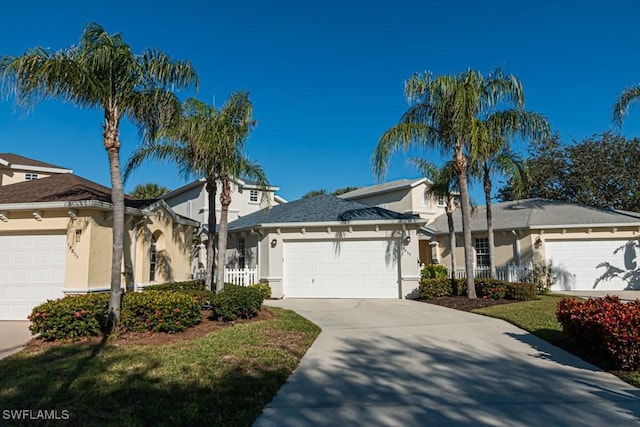 single story home featuring a garage