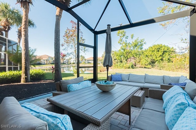 view of patio / terrace featuring an outdoor hangout area and a water view