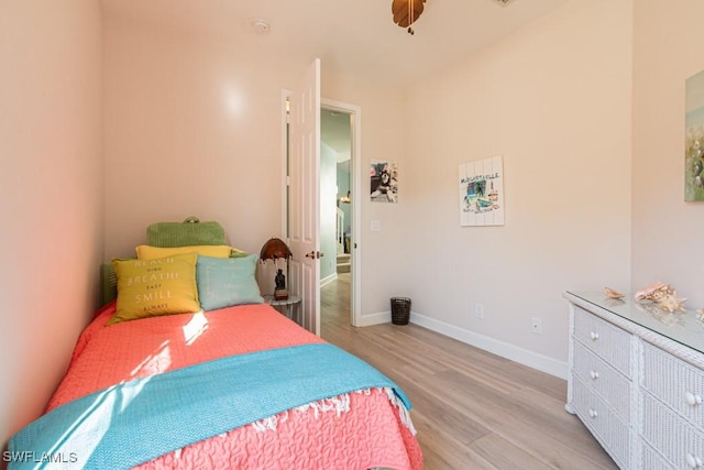 bedroom with light wood-type flooring