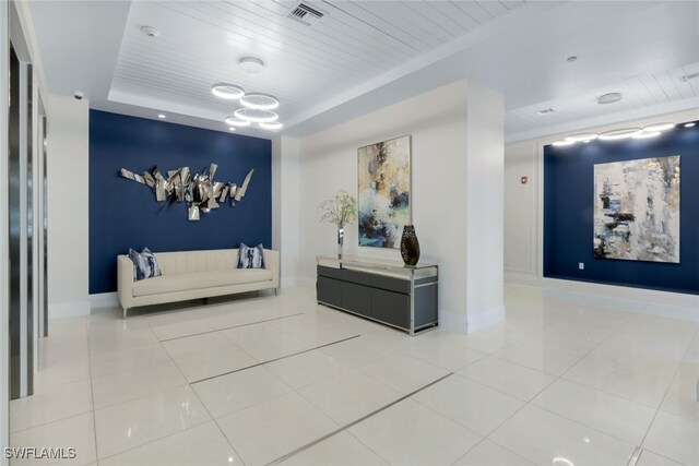 1030 3rd Ave S Unit 419, Naples, FL 34102 - building lobby with wooden ceiling and a surveillance system