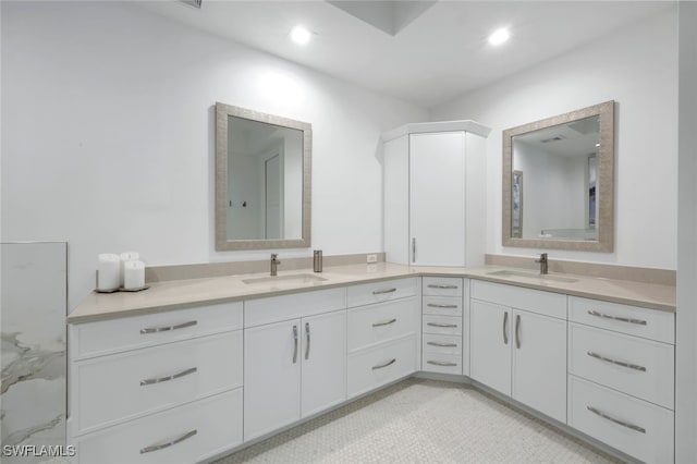 1030 3rd Ave S Unit 419, Naples, FL 34102 - bathroom featuring double vanity and recessed lighting