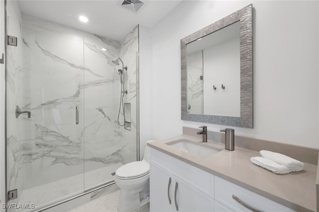 1030 3rd Ave S Unit 419, Naples, FL 34102 - bathroom featuring a marble finish shower, vanity, toilet, and recessed lighting