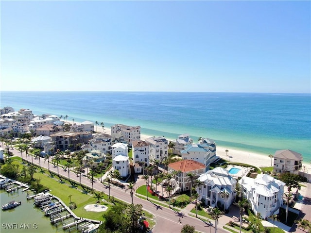 aerial view featuring a water view and a view of the beach