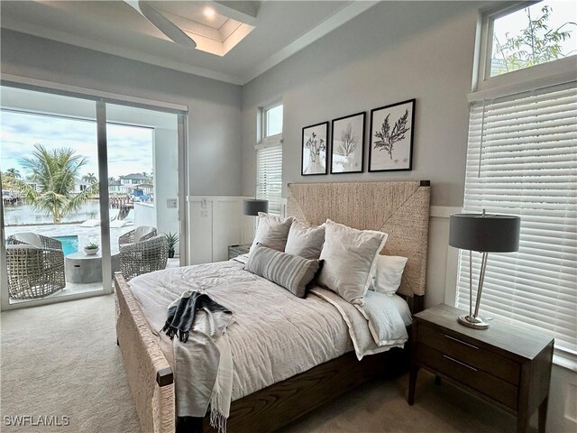 bedroom featuring ceiling fan, light carpet, and access to outside