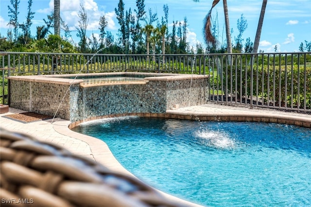 view of swimming pool featuring pool water feature