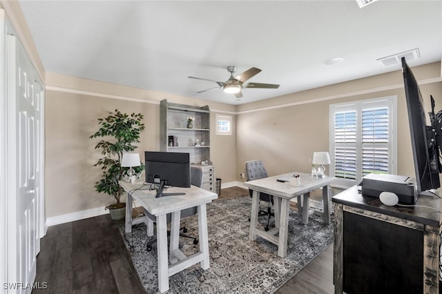 office with ceiling fan and dark hardwood / wood-style flooring