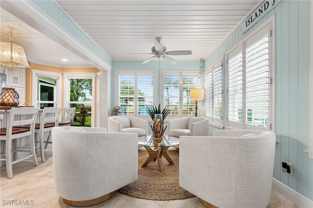 sunroom / solarium with ceiling fan