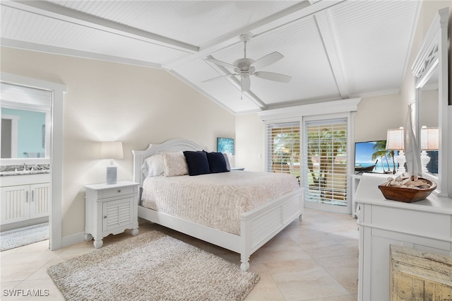 tiled bedroom featuring ceiling fan, sink, connected bathroom, and lofted ceiling with beams