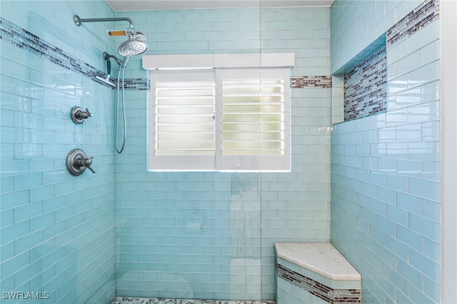 bathroom featuring tiled shower