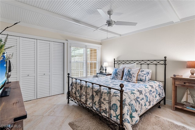 bedroom featuring ceiling fan, light tile patterned flooring, and beam ceiling