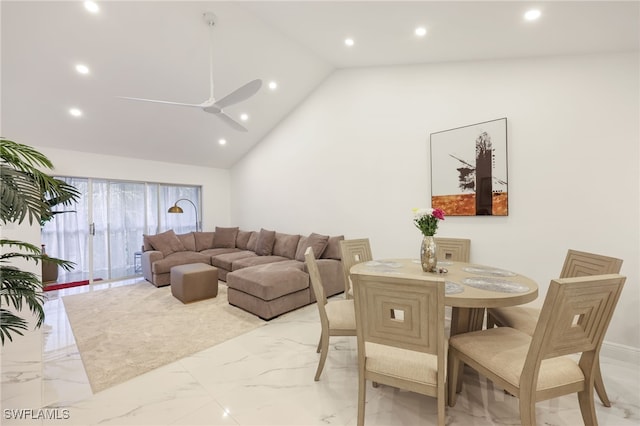 dining area featuring vaulted ceiling and ceiling fan