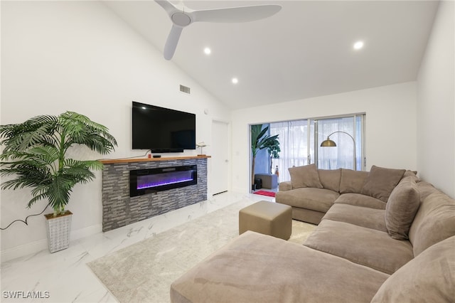 living room featuring high vaulted ceiling, a fireplace, and ceiling fan